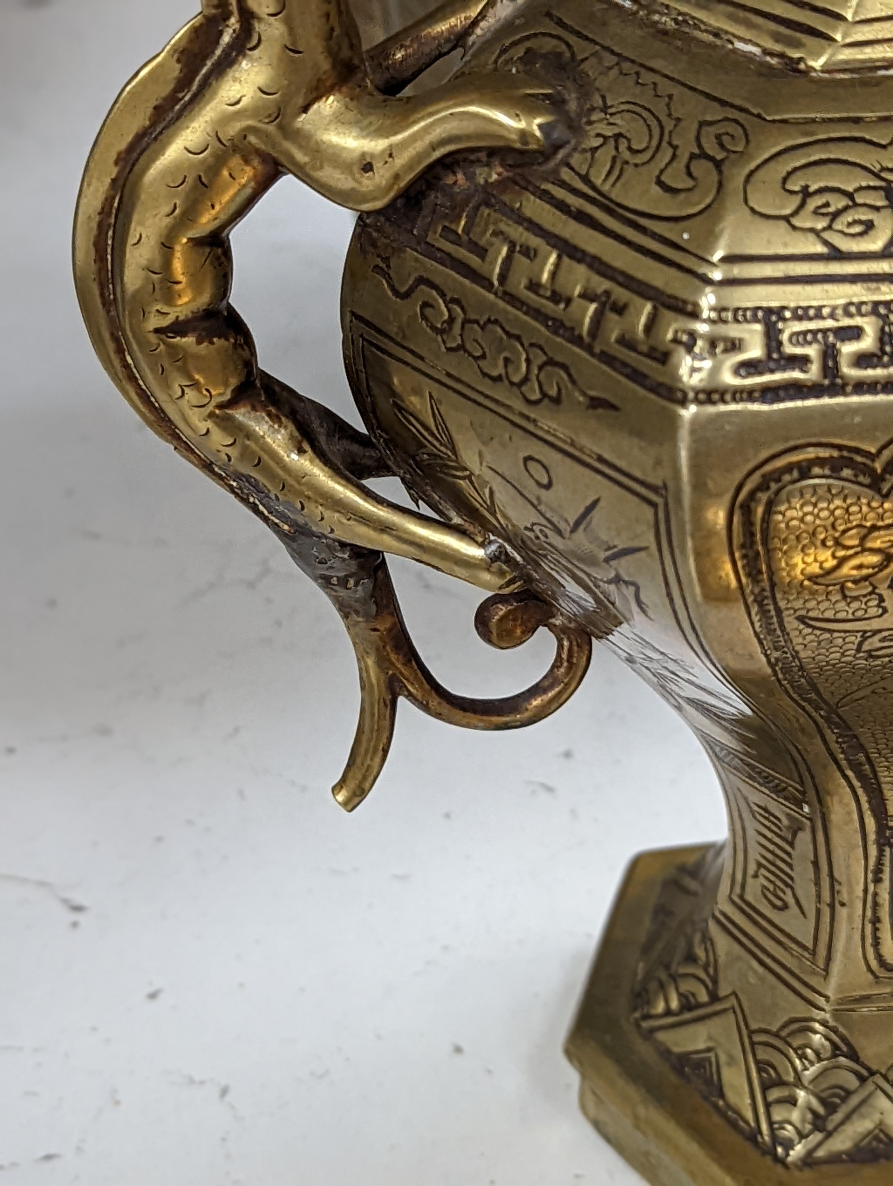 Two early 20th century Chinese bronze vases and a similar tray, 35cm diam.